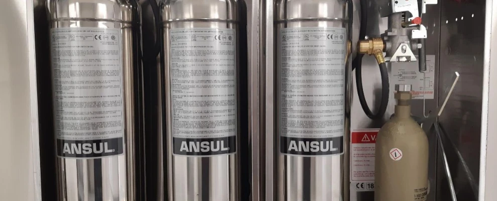 Ansulex‑behållare i ett kökssläcksystem.